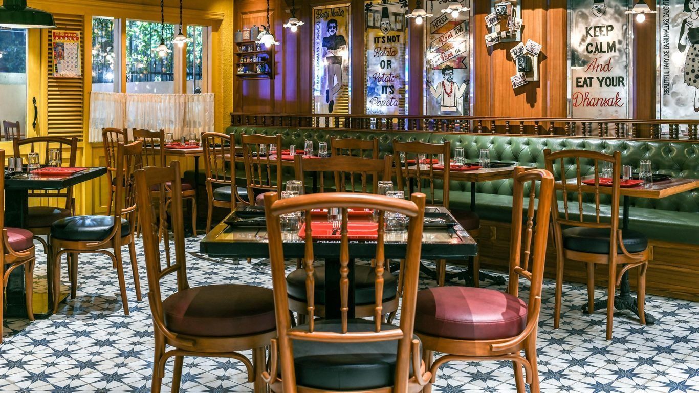 Lamplit heritage interior in Bombay set for a private sound session